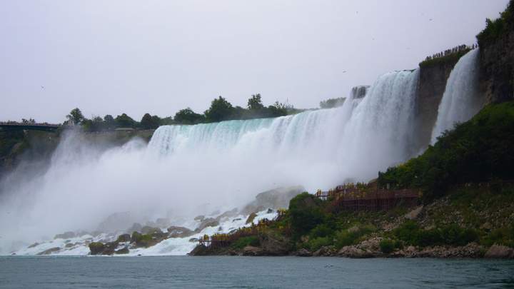 Niagara Falls: wide view of water, mist, and sky